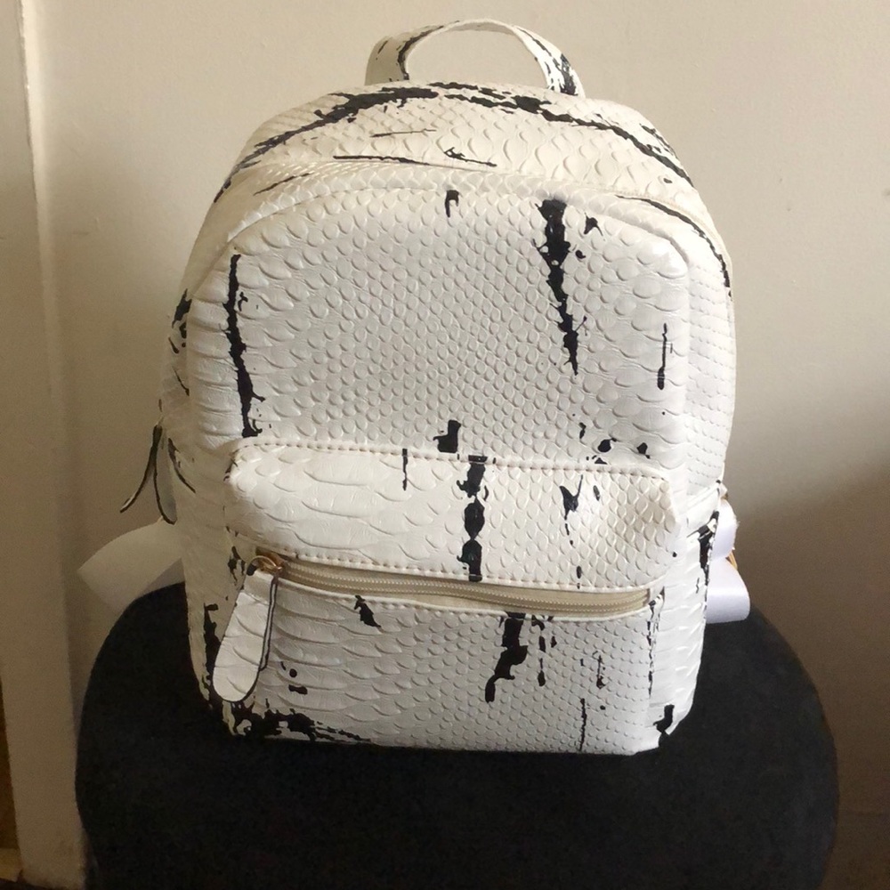 DollsKill Stone Cold Marble Backpack